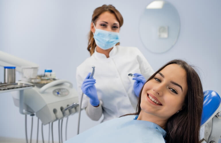 Dentist preparing tools for checkup