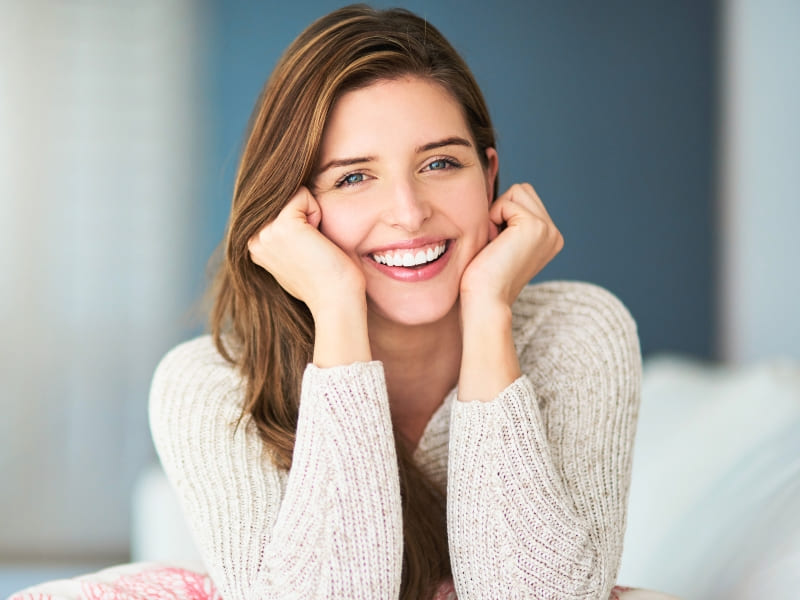 Happy woman with glowing smile mobile