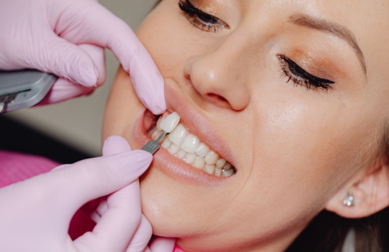 A woman receiving a dental treatment